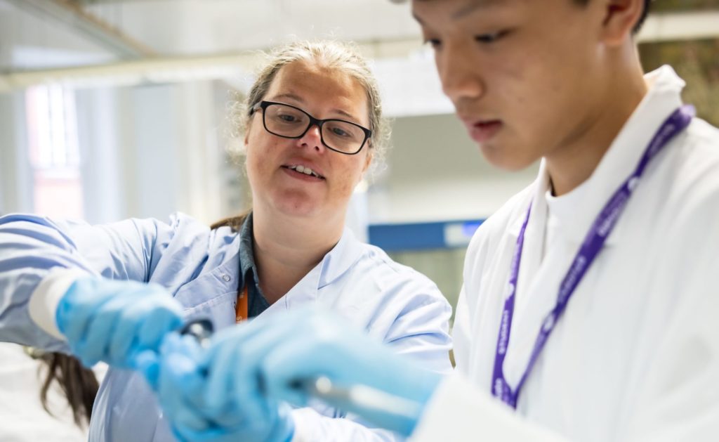 Professor and student at UCL lab at Innovate Summer Academy