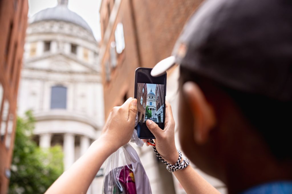 Language in Action student taking picture of St Paul's Cathedral