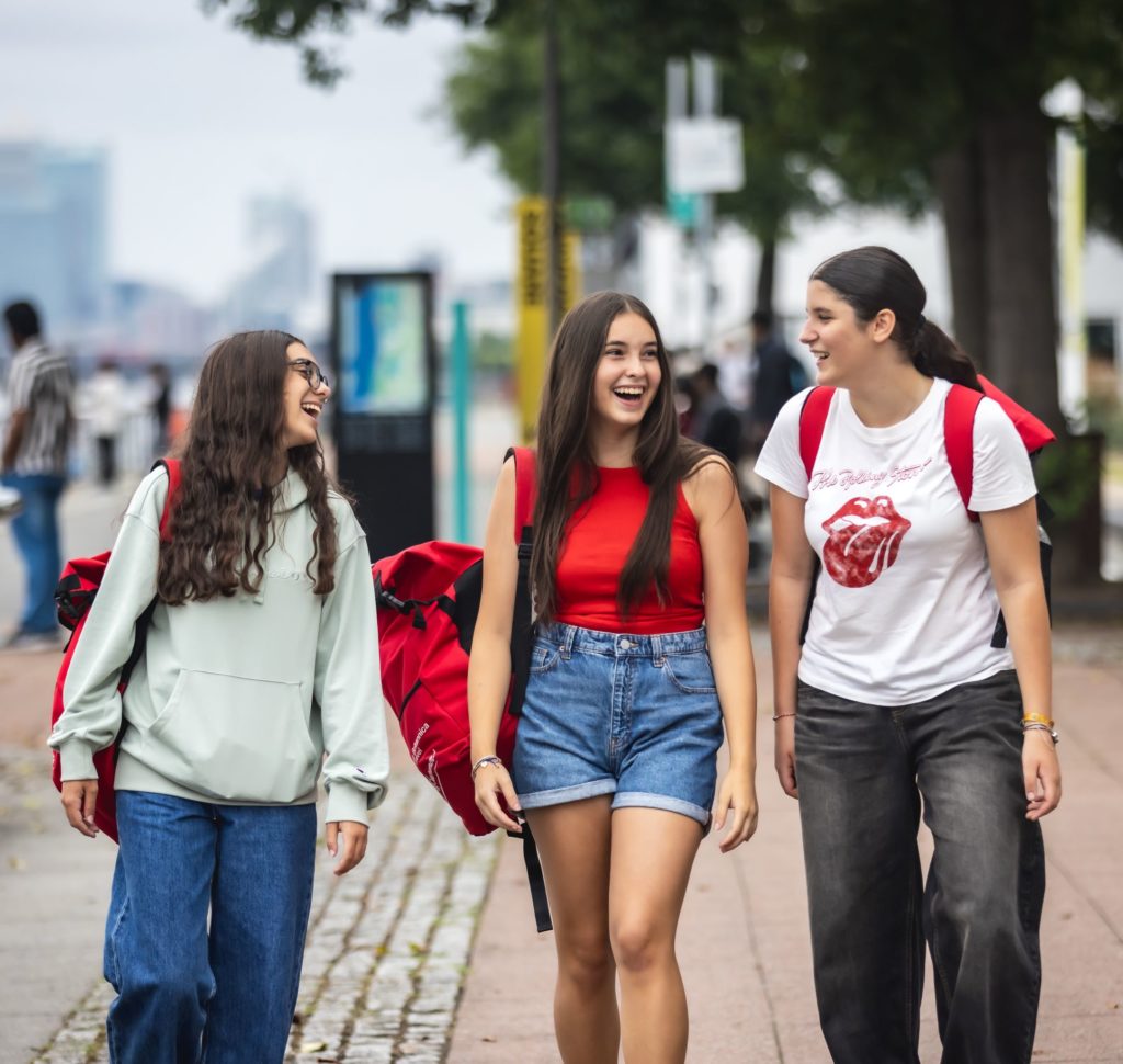 Girls walking at UEL docklands campus