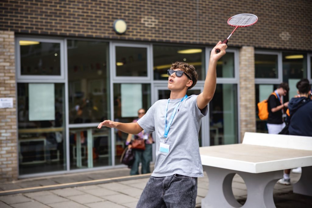 Boy with badminton racket