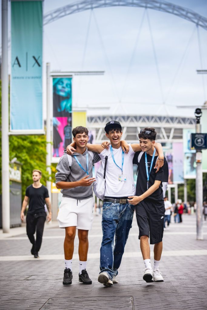 Language in Action students walking by Wembley Stadium