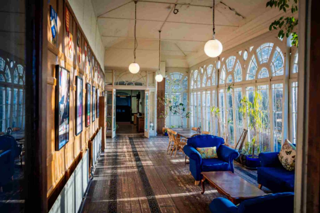 Beechwood common area with sofas and large windows
